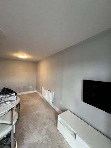 Wallpaper removal and painting in Bearsden living room, kitchen, hall and bedroom by Kastle Decor