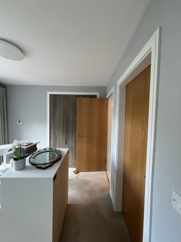 Wallpaper removal and painting in Bearsden living room, kitchen, hall and bedroom by Kastle Decor