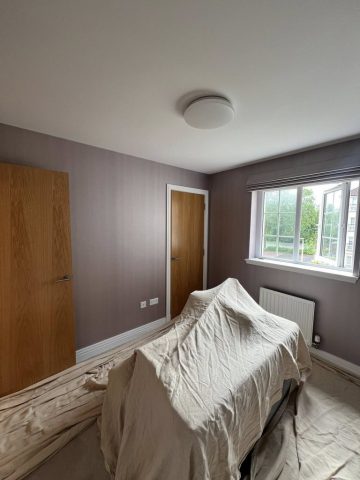 Wallpaper removal and painting in Bearsden living room, kitchen, hall and bedroom by Kastle Decor