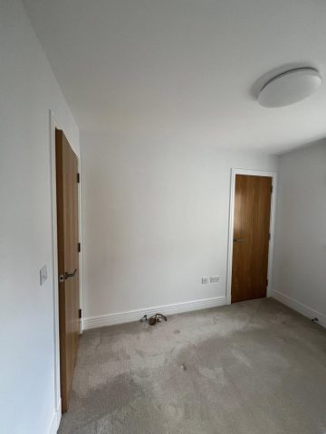 Wallpaper removal and painting in Bearsden living room, kitchen, hall and bedroom by Kastle Decor
