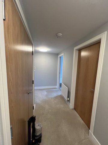 Wallpaper removal and painting in Bearsden living room, kitchen, hall and bedroom by Kastle Decor