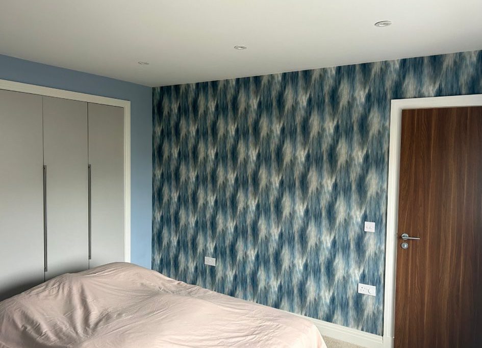 Modern wallpaper installation in Strathaven bedroom by Kastle Decor