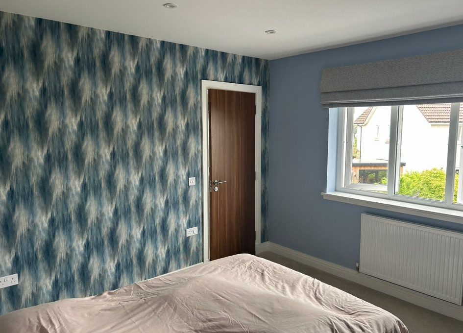 Modern wallpaper installation in Strathaven bedroom by Kastle Decor