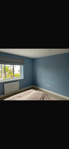 Modern wallpaper installation in Strathaven bedroom by Kastle Decor